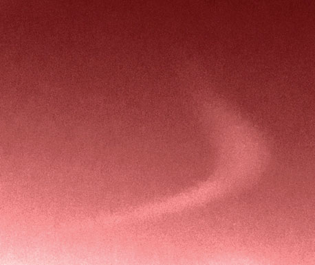 Image of a daytime lithium trail near 68 miles/110 kilometers altitude from a sounding rocket launched from Wallops Island, Virginia, in July 2013.